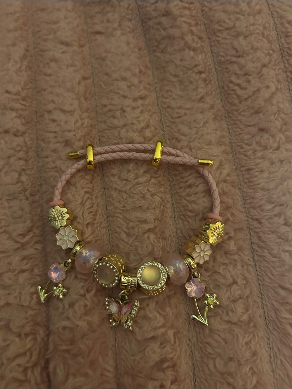 Gold and Blush Pink Charm Bracelet with Butterfly and Floral Accents